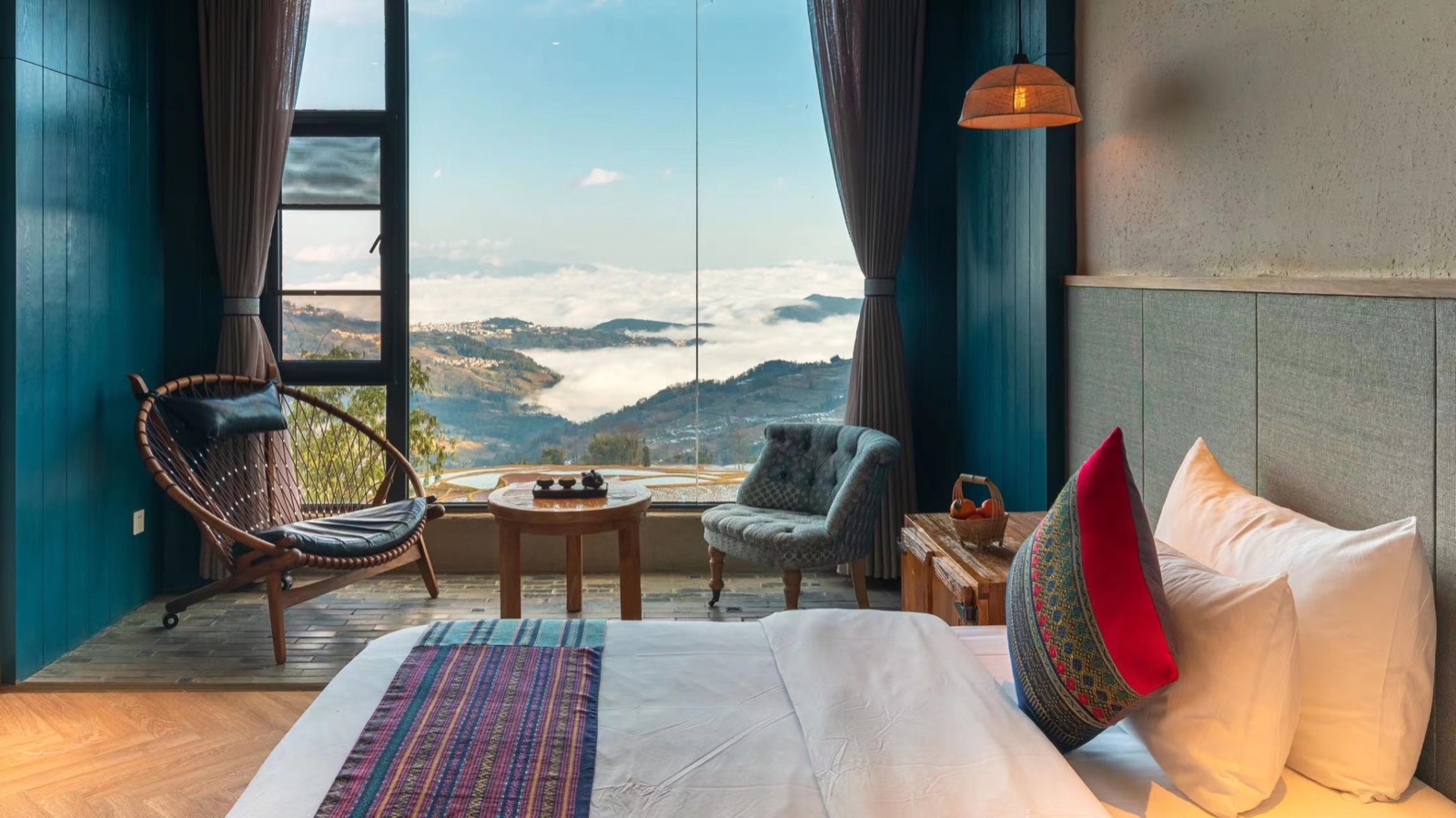 Panorama king room with a terrace view, bed and sitting area